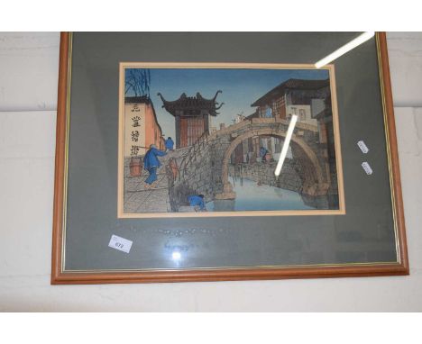 Japanese coloured wood block print of a bridge, framed and glazed