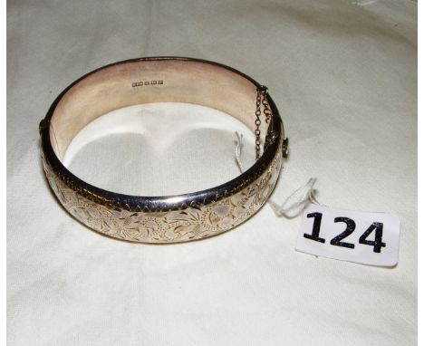 A sterling silver etched bangle, hallmarked for Birmingham.