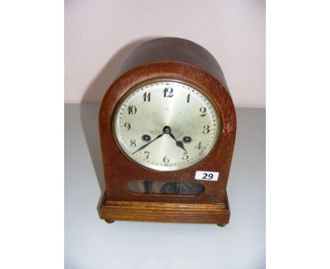 A dome shaped oak cased Junghans bracket clock, movement B20.