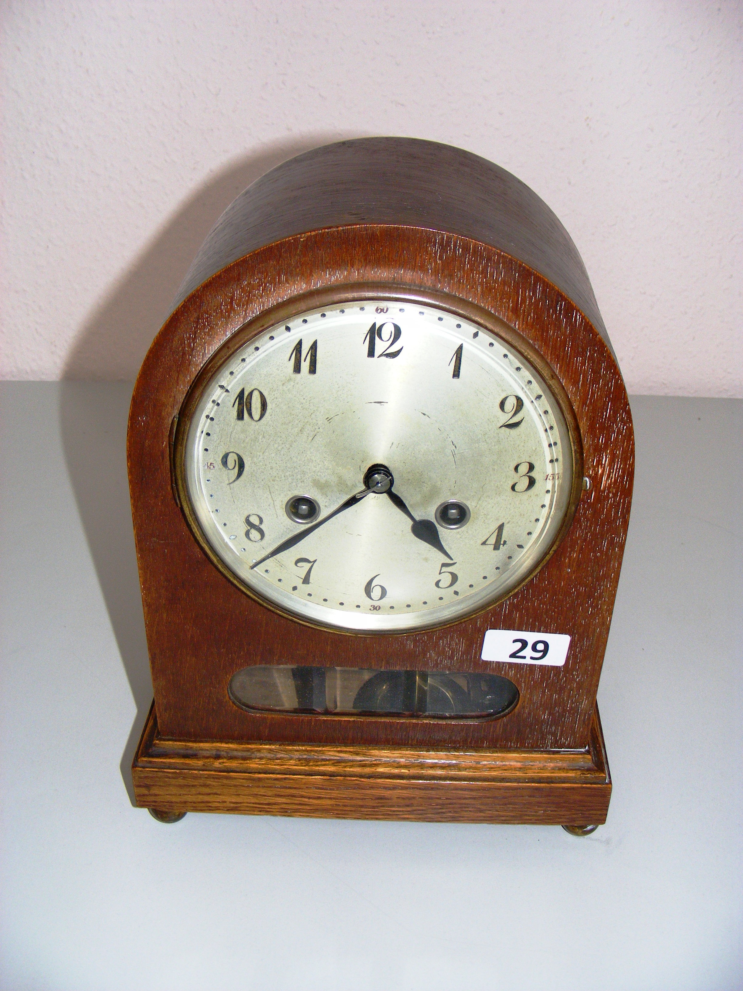 A dome shaped oak cased Junghans bracket clock, movement B20.