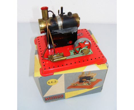 A Mamod boxed steam engine.