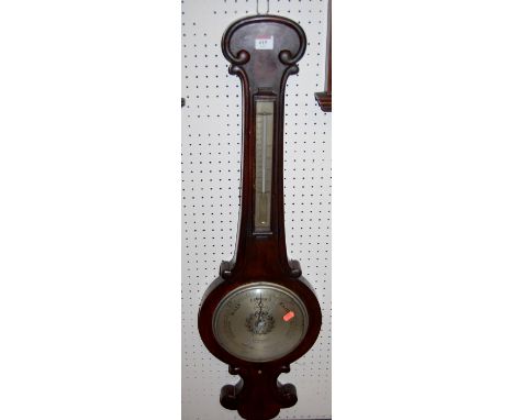 A Victorian mahogany two dial wheel barometer, together with an oak two dial aneroid barometer (2)