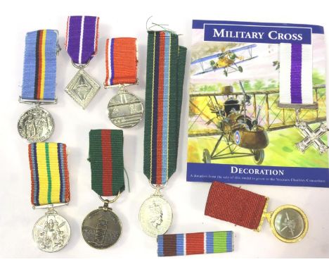 Eight medal miniatures and a ribbon bar. P&amp;P Group 1 (£14+VAT for the first lot and £1+VAT for subsequent lots) 
