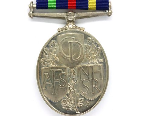 British Civil Defence Long Service medal in original presentation case. P&amp;P Group 1 (£14+VAT for the first lot and £1+VAT