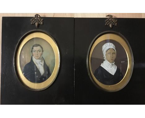 English school, early 19th Century, two portrait miniatures, one of young gentleman in white stock and dark green buttoned co