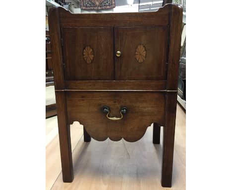 A late George III campaign commode, twin handled gallery top, pot cupboard, pull out seat, brass swing handles, inlay to draw