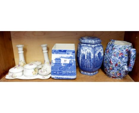 A Ringtons blue and white tea caddy and another with no lid plus a jug (handle a/f) and an Edwardian dressing table set 