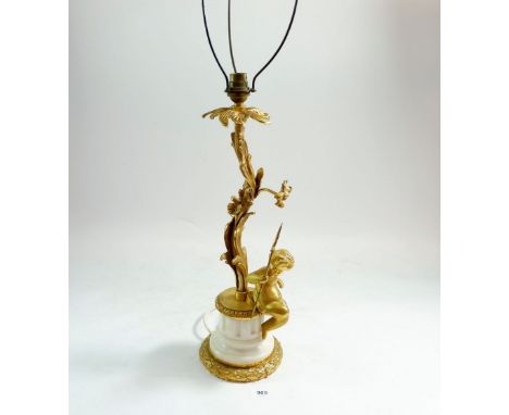 A gilt metal lantern form table lamp with cherub to stem, 73cm high 