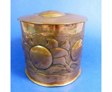 A Newlyn copper tea caddy embossed medlars and leaves 10cm, impressed mark to base 