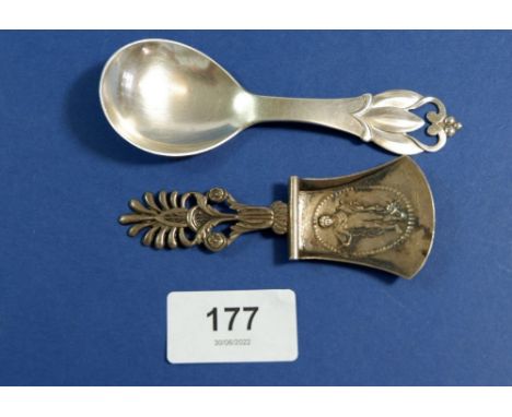 Two silver caddy spoons, one Danish and the other with Chester import hallmarks for 1906 by BM 