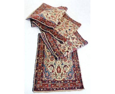 A Liberty's bought Hamadan runner with floral decoration on a cream ground, 543 x 70cm (with handwritten Liberty's receipt da
