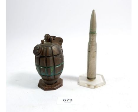 A hand grenade converted to cigarette lighter and a shell case converted to a cigarette lighter 