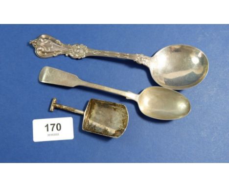 A silver teaspoon Newcastle 1865 by Thomas Seweell I, a silver shovel form caddy spoon Sheffield 1921 by Thomas Bradbury &amp