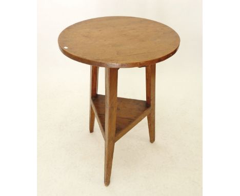 A 19th century light elm cricket table, 48 cm diameter 