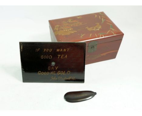 A red lacquer advertising tea caddy for Gold Tea with original spoon 