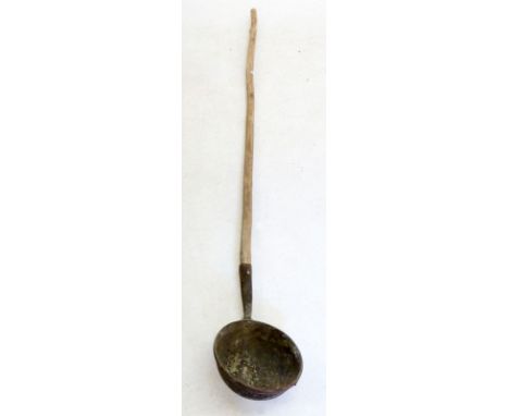A large agricultural cider ladle tool with long handle 