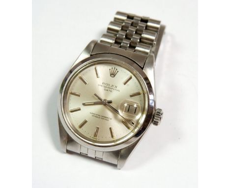 A Rolex Oyster Superlative Chronometer Date gentleman's watch in stainless steel with original vendors purchase certificate a
