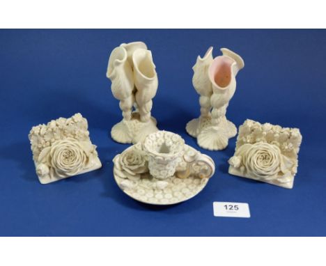 A pair of Belleck floral clad menu holders, two Belleck style shell vases and chamber stick, some a/f