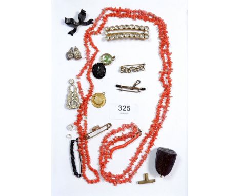 A box of antique costume jewellery including compass fob, coral necklace and paste 