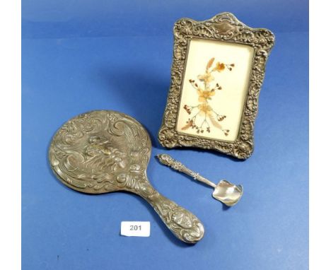 A silver framed mirror, photograph frame Birmingham 1901 20 x 14cm and a silver caddy spoon Birmingham 1854 by George Unite 