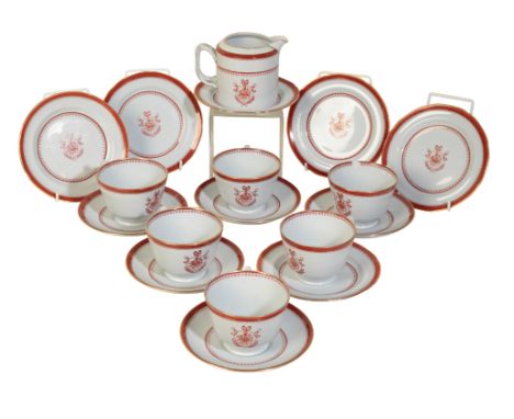 A SPODE BREAKFAST SERVICE decorated in iron red with a basket of flowers within a shield, comprising:a cylindrical sugar bowl