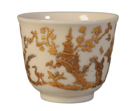 A DEHUA BLANC DE CHINE BEAKER the porcelain Kangxi, Paris decoration added 1700-1720, decorated with applied gold foil chinoi