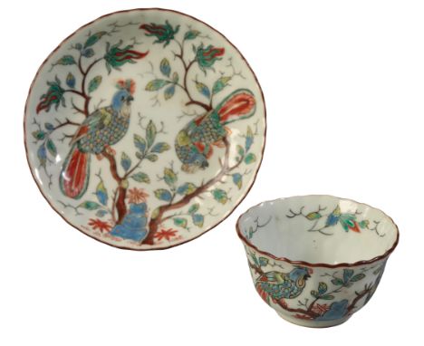 A CHINESE TEA BOWL AND SAUCER Jingdezhen, the Dutch decoration circa 1720-25, perhaps by Gerrit van der Kaade, after Adriaen 