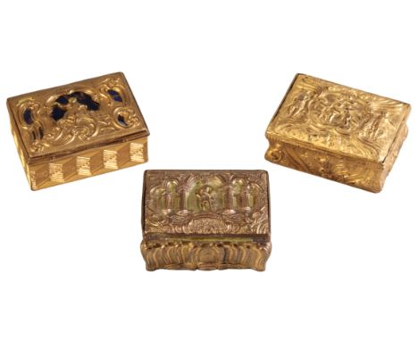 A GEORGE II GILT METAL SNUFF BOX the rectangular hinged lid with a figure astride rocaille work beneath a rococo canopy with 