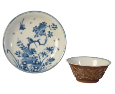 A CHINESE TEA BOWL AND SAUCER the porcelain late Kangxi, with blue square seal marks, the engraving probably Dresden, circa 1