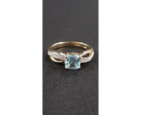 9CT GOLD DIAMOND AND BLUE TOPAZ RING