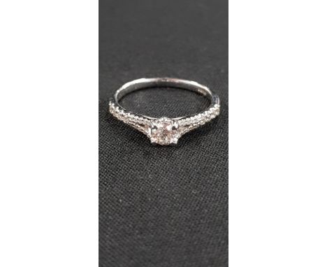 9 CARAT WHITE GOLD &amp; DIAMOND RING WITH CIRCA HALF CARAT OF DIAMONDS