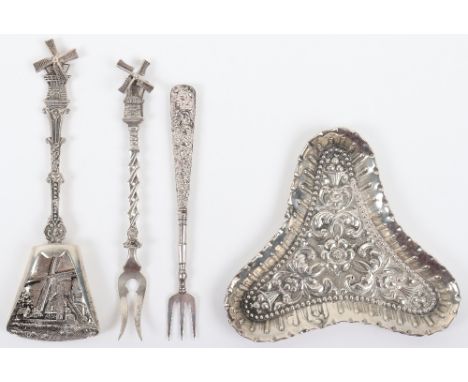 A Dutch silver caddy spoon and pickle fork, with a Victorian siler trinket dish, and another pickle fork, (4), total 64g