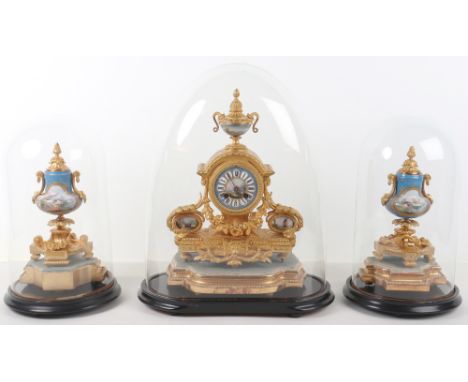 A 19th century French Sevres style porcelain mounted gilt metal mantle clock stamped P.H. Mourey, with porcelain panels signe