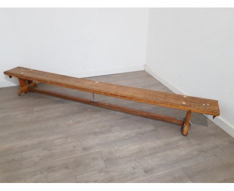 A vintage PE school bench with metal supports.
