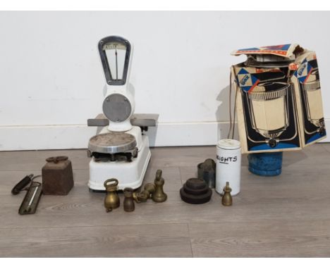 A set of Avery scales with a selection of weights, and a butane camping stove in original box.