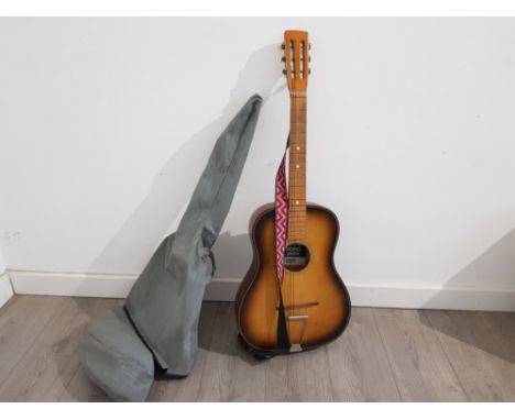 A CSL sumbro acoustic guitar model ps1, in fitted bag.