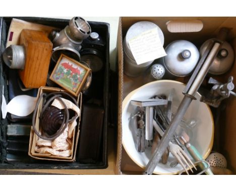 A leather suitcase of collectables, including Bakelite microphone, opera glasses, corkscrews, thermometer, travel clock, cham