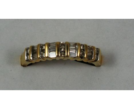 An 18ct gold and diamond half eternity ring, alternately set with baguette and brilliant cut stones, total weight approximate