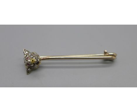 A fox head pin brooch set with old diamonds and cabochon ruby eyes, lacking one diamond, 3.1g 
