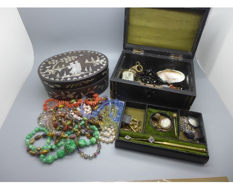 A Victorian jewellery box with key containing cameo, lockets, shell purse, stick pin, rosary, etc., and a Chinese papier mach