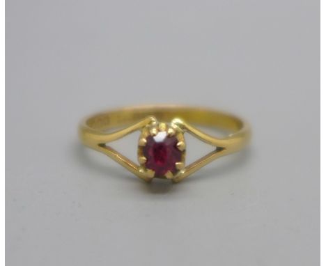 A Victorian 22ct gold, ruby solitaire ring, worn mark, 2.8g, N 