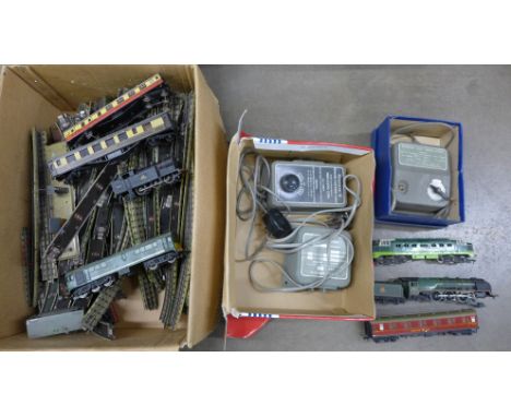 A collection of 00 gauge model rail, three locomotives, coaches, track and power pack, etc., a/f 