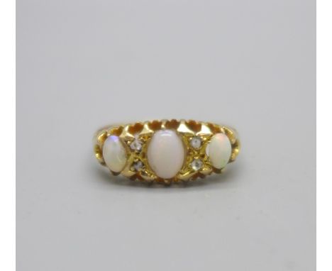 An 18ct gold, opal and diamond ring, Chester 1899, 3g, R 