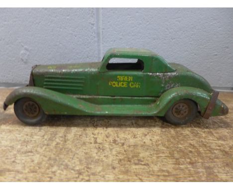A 1930's Marx clockwork pressed steel American police car, 37cm 