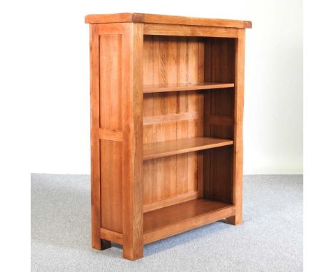 A modern light oak dwarf open bookcase89w x 30d x 109h cm