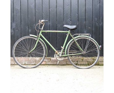 A vintage green bicycle