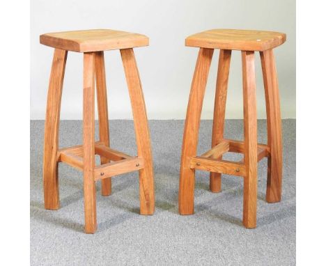 A pair of modern light oak bar stools, 73cm high