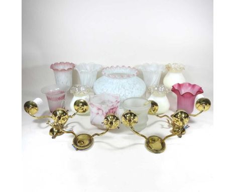 A pair of brass twin branch wall sconces, together with another and a collection of coloured glass light shades
