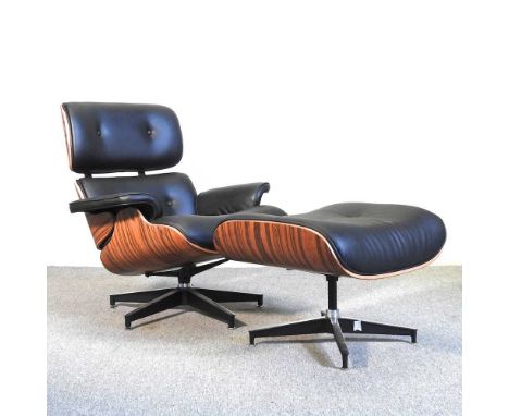 After Charles and Ray Eames, a black upholstered Lounge chair and matching ottoman (2)Overall condition is clean and usable, 