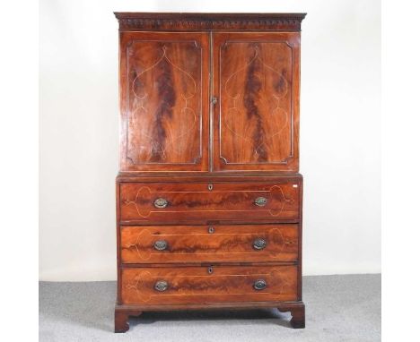 A George III inlaid mahogany secretaire cabinet, with a moulded cornice, fitted with a secretaire, on bracket feet122w x 55d 